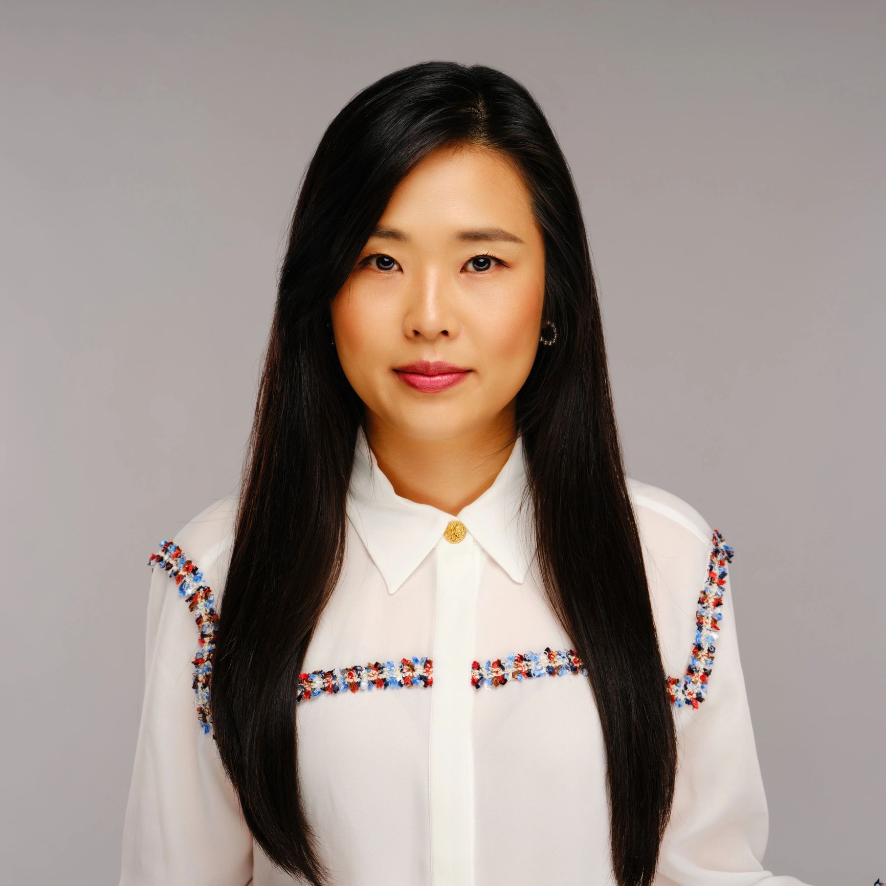 Professional headshot representing a proposal manager