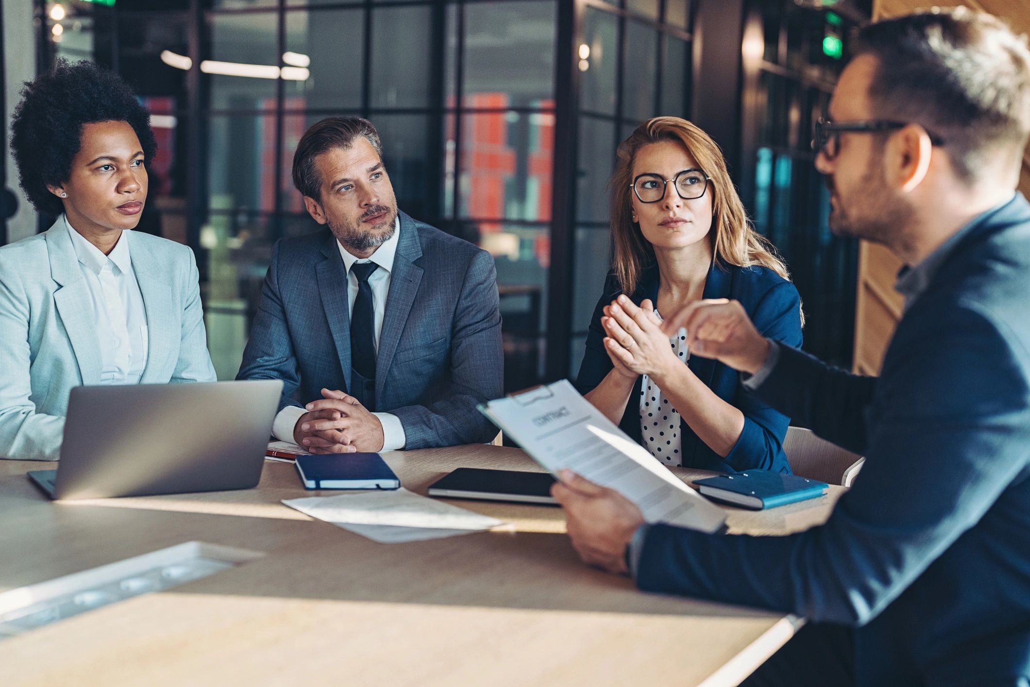 Business professional presenting a plan during a meeting