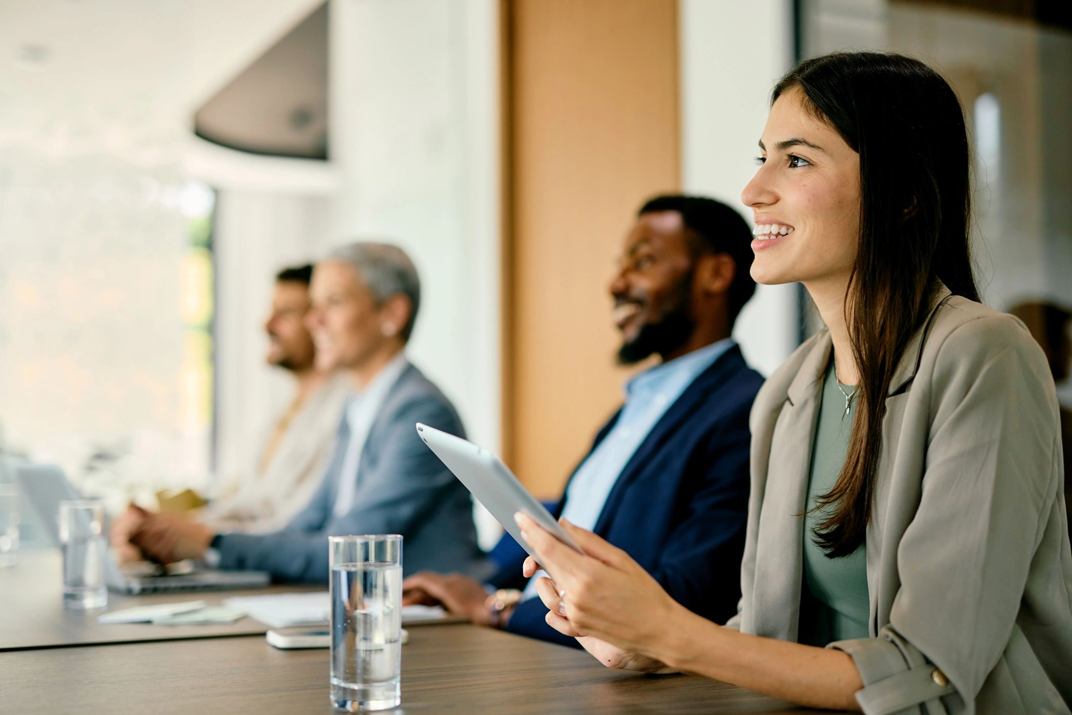 Professionals collaborating in a conference room meeting