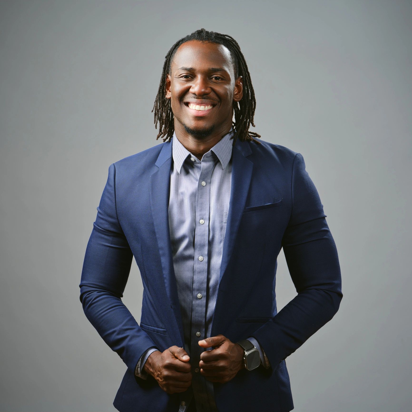 Professional headshot representing a program executive